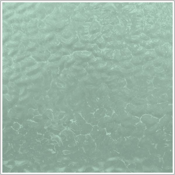 A close-up texture swatch of a light mint green material with a subtle, wavy, embossed pattern.