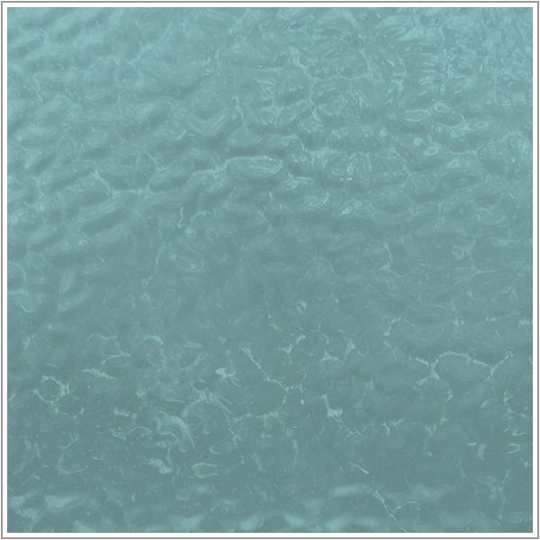 A square close-up of a textured, shimmering teal-blue surface, resembling a liquid texture or metallic paint swatch, framed by a thin white border.