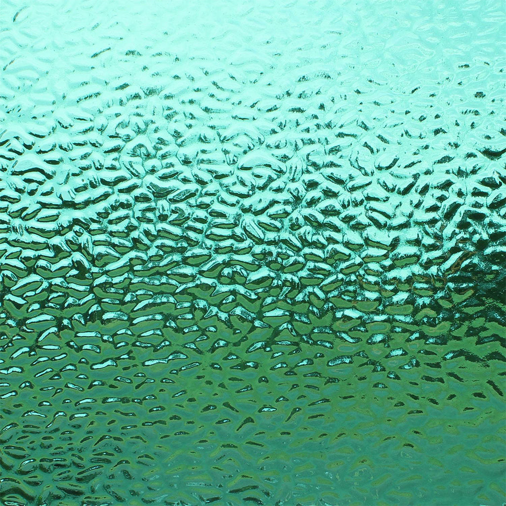 Textured glass with a wavy, rippled pattern in shades of teal, aqua, and green.