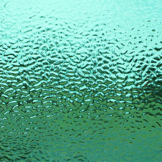 Textured glass with a wavy, rippled pattern in shades of teal, aqua, and green.