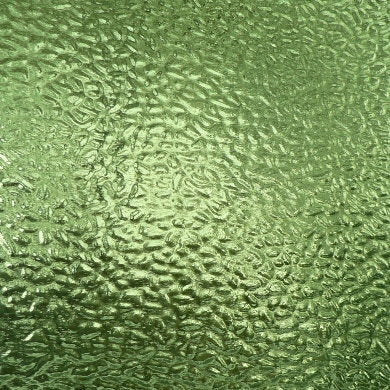 A close-up of a textured green surface with a wavy, embossed pattern and a glossy finish.