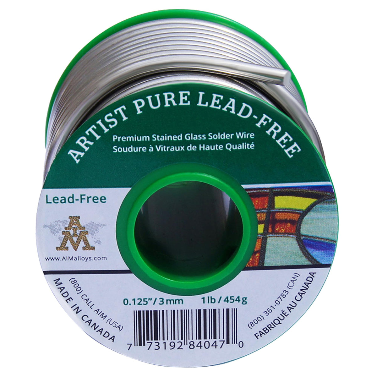 A spool of Artist Pure Lead-Free glass solder wire, featuring a green and white label with the brand logo and product details, on a white background.